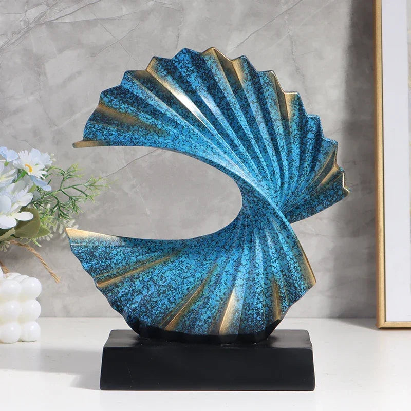 Escultura Abstrata Onda Dourada em Resina com Base Preta Lenogue Azul